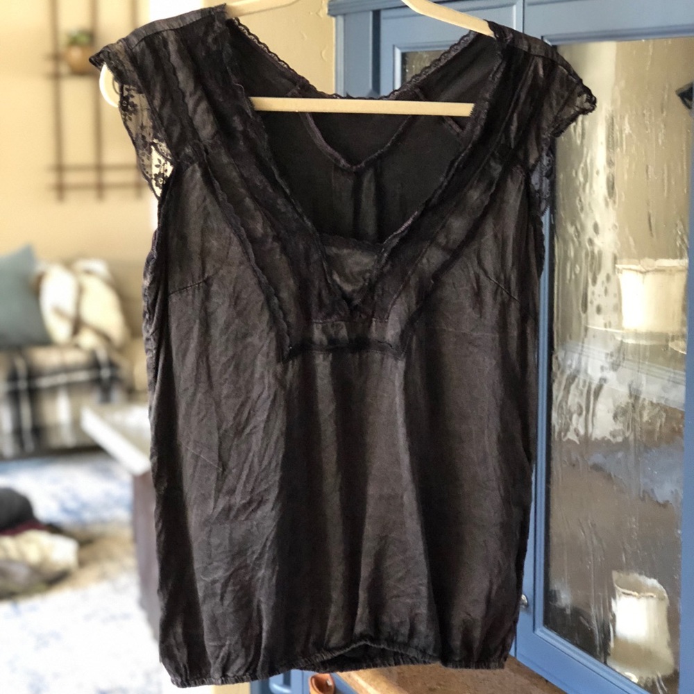 Black with purple hues, medium detailed blouse